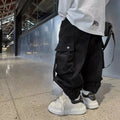Children's cotton workwear trousers available in beige and black for heights 120cm to 170cm mid-waist fit