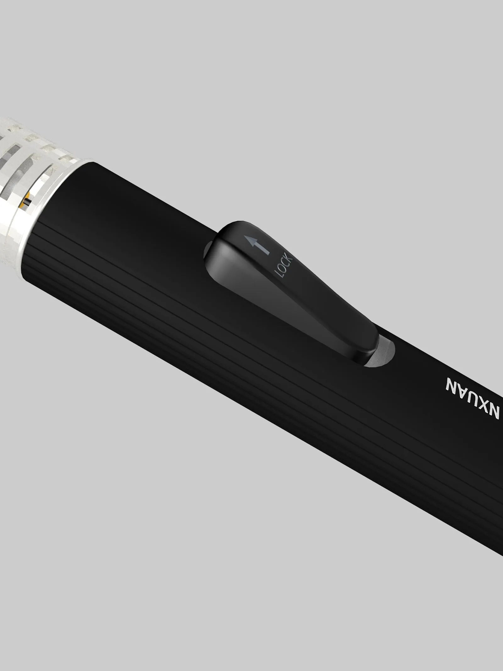 Portable metal flamethrower torch in black with child lock, 200g weight, on outdoor surface with gas bottle