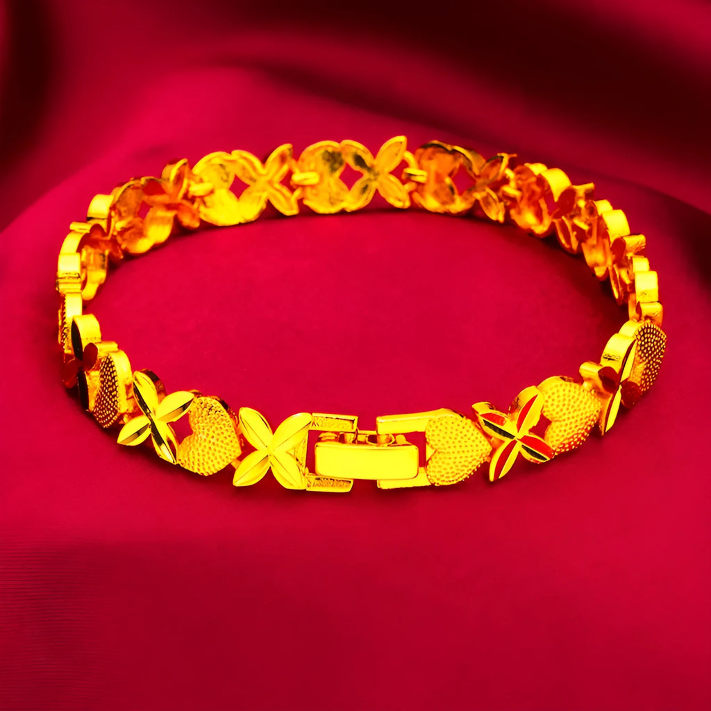 Sand gold four-leaf clover heart bracelet in brass with electroplated textured finish