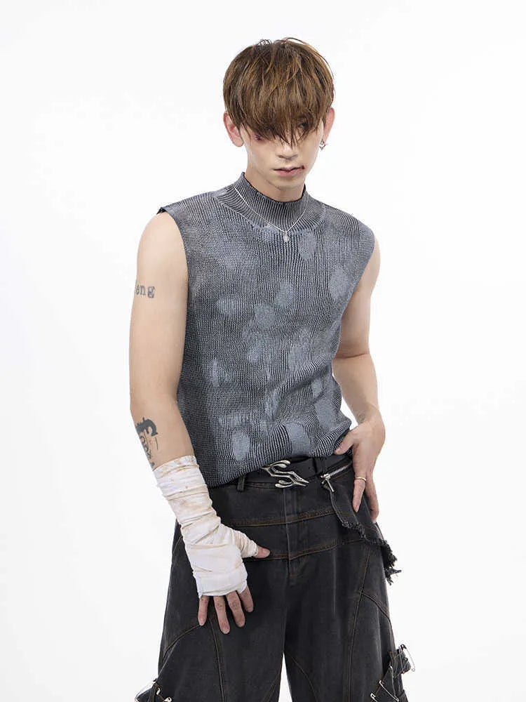 Men's black silver pastebrushing wool sleeveless top with turtleneck collar on mannequin