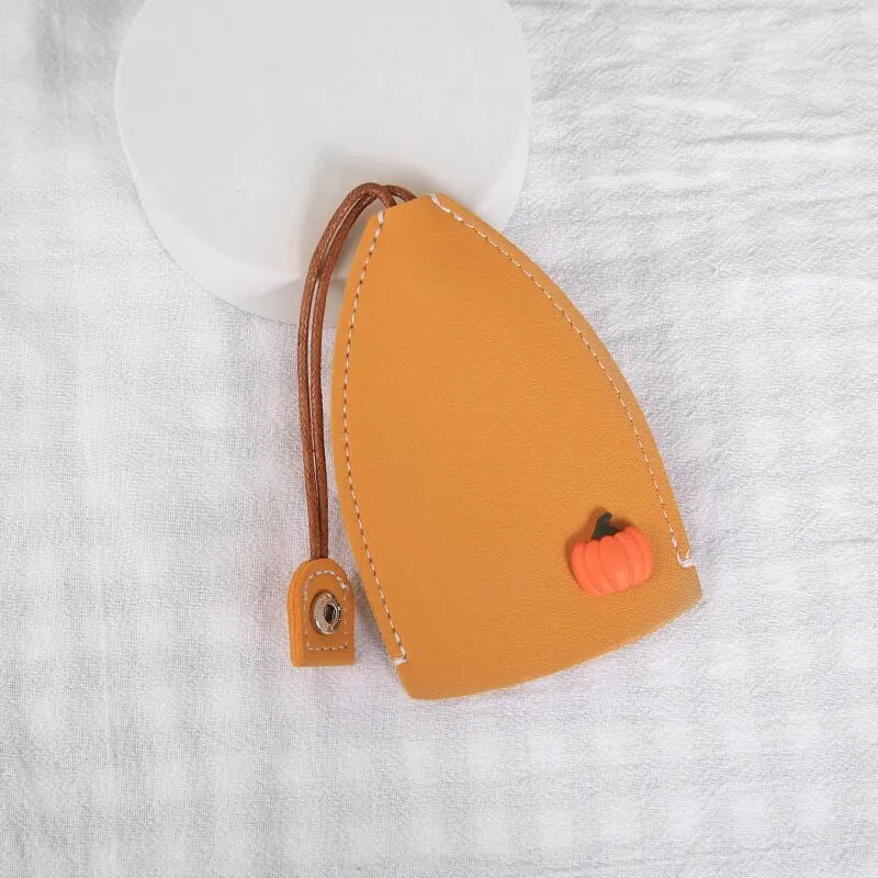 Cartoon pull-out car key case in PU leather with various design options including cactus, rabbit, and fruit themes