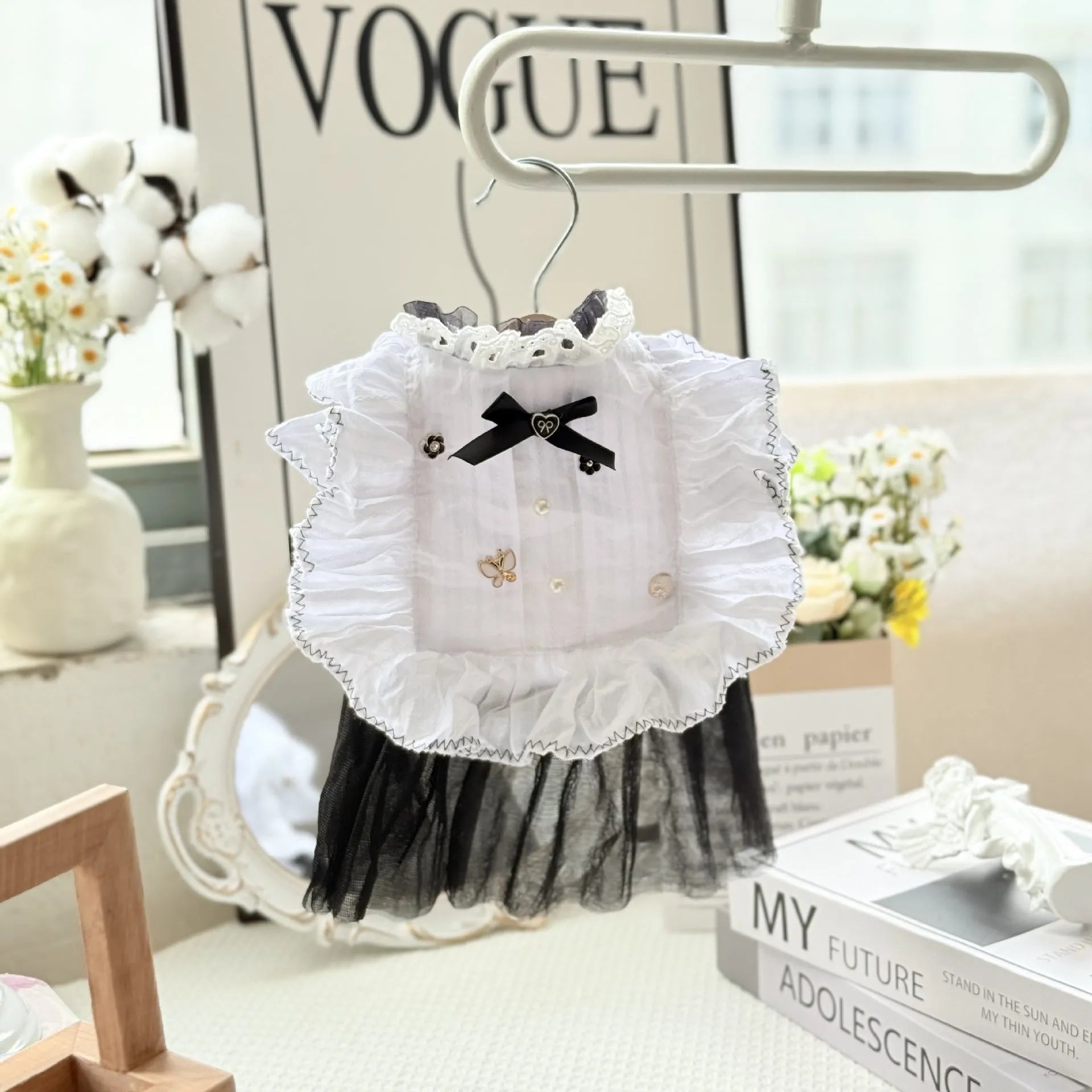 White princess-style gauze skirt dog dress on a mannequin, showing the layered skirt design.