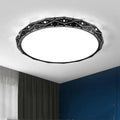 Round LED ceiling light with black iron frame and dimmable lighting options