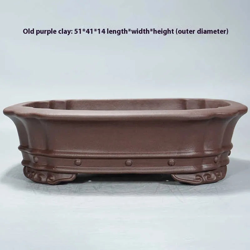 Purple clay rectangular flower pot with antique design measuring 51x41x14cm