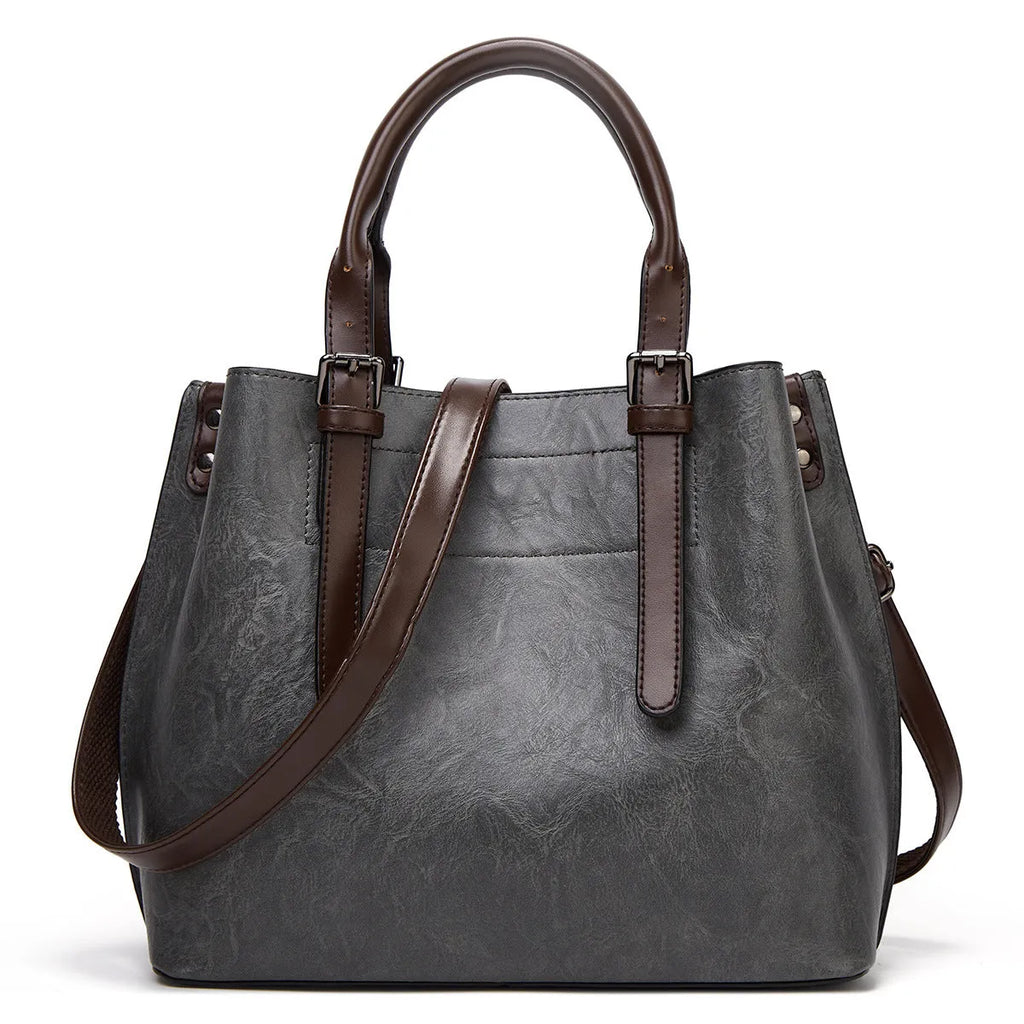 Bright red retro PU handbag with contrast shoulder strap and square vertical shape for women