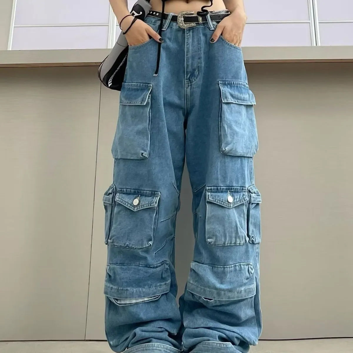 Women's high waist wide leg jeans in tie-dyed denim with multiple pockets and street hipster styling