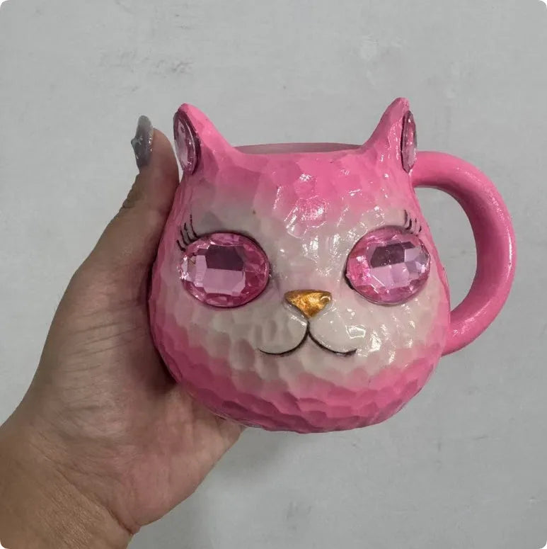 American style resin cat cup decorative figurine in purple, green, blue, or pink.