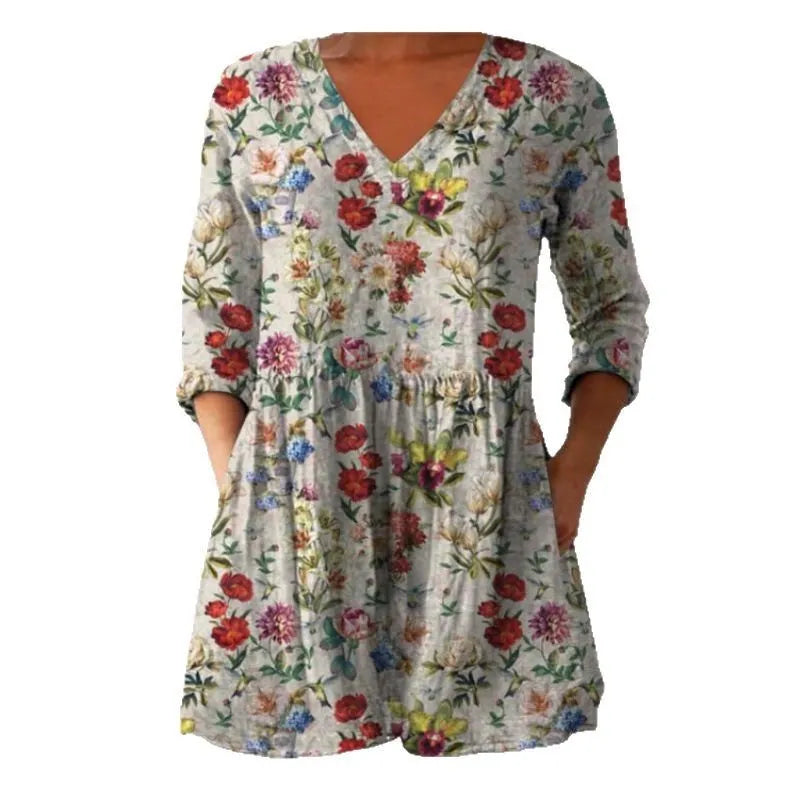 Women's printed loose dress with 3/4 sleeves and wide waist in colourful pattern