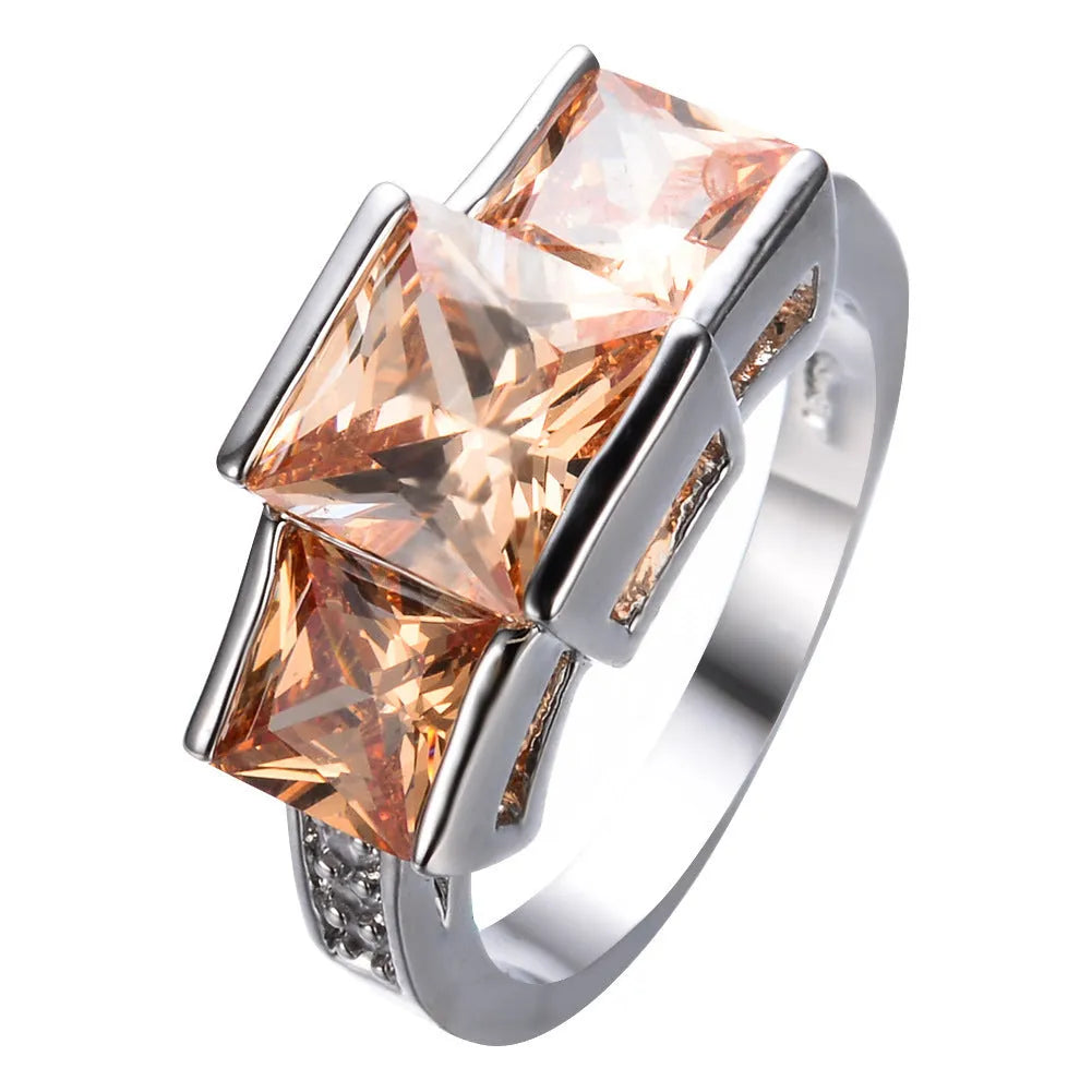 Copper ring ornament in various colours showing geometry and rainbow elements with size options