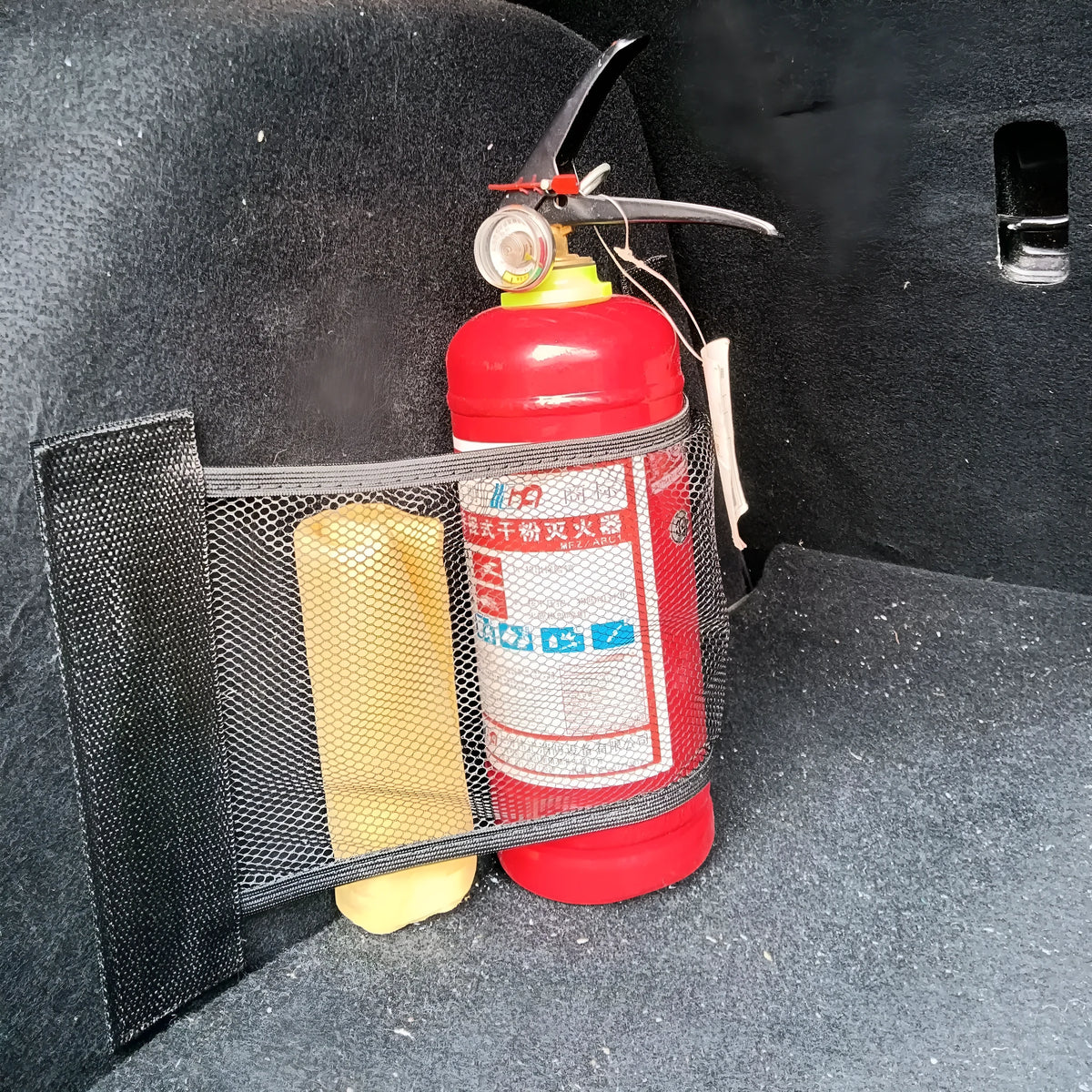 Stretchy polyester car boot storage net with hook and loop fasteners, shown in 20x45cm size.