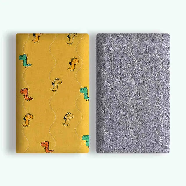 Double-sided cotton fleece pet blanket showing dinosaur print design, folded to show soft texture.