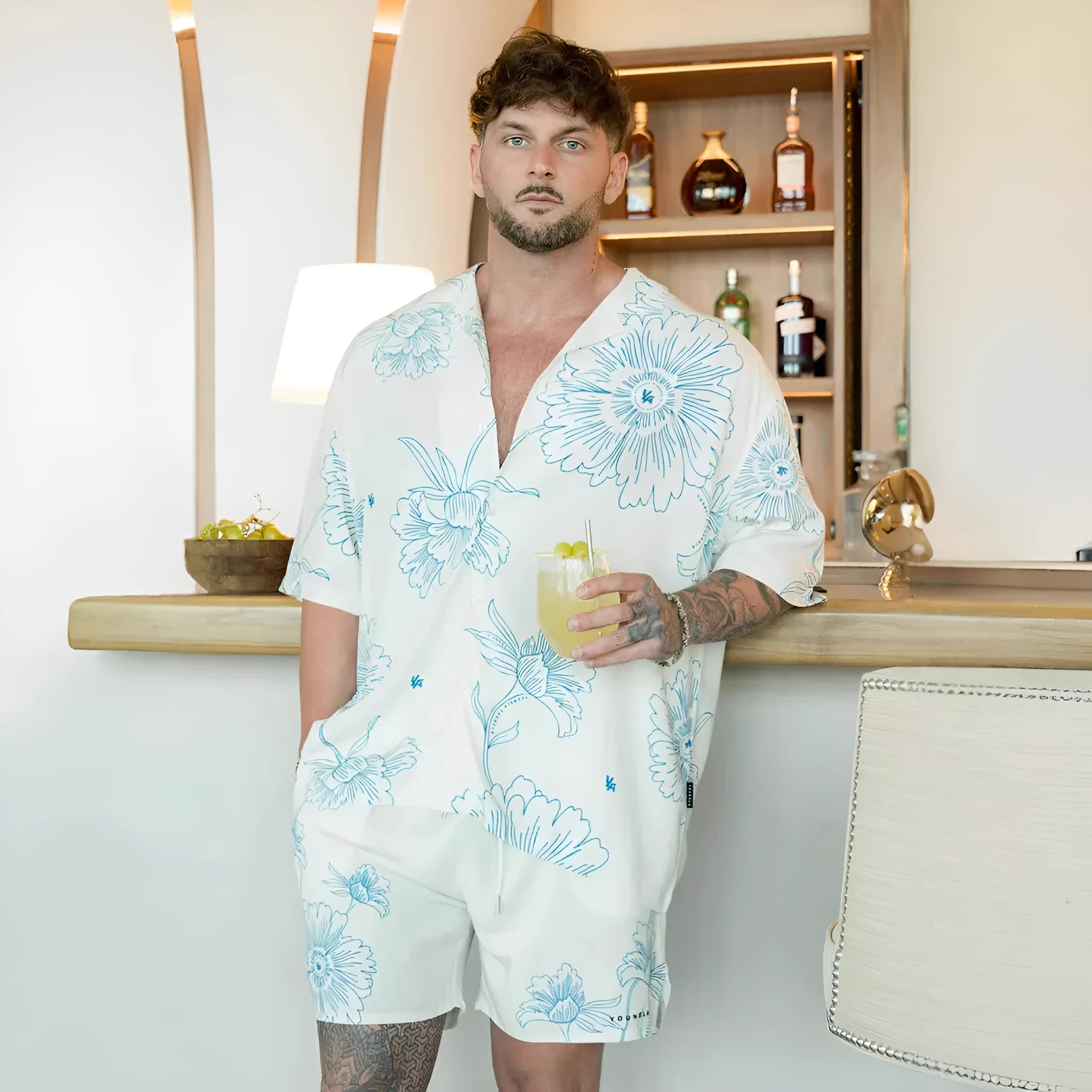 Men's loose fit short sleeve top with floral pattern in polyester elastic fabric for summer
