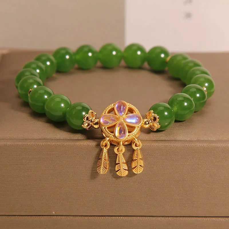 Original women's bracelet with a green jasper crystal four-leaf clover dream catcher pendant.