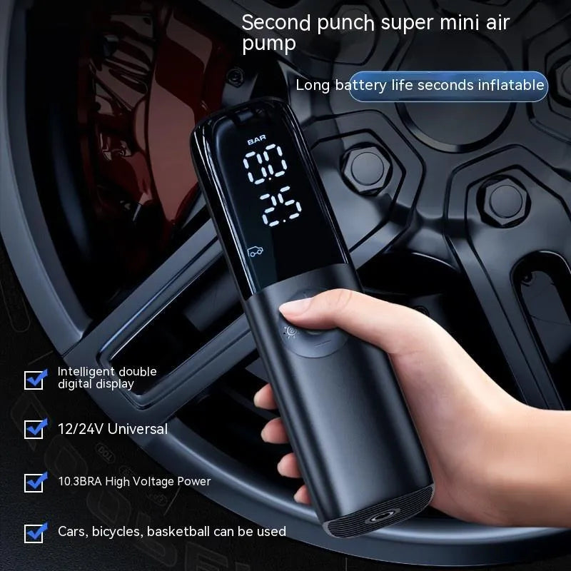 Black portable electric car air pump with pressure gauge and inflation tube