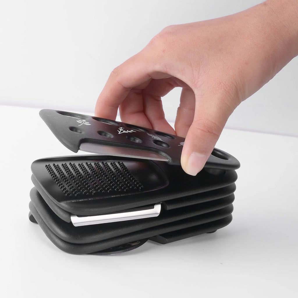 Six stackable kitchen gadgets with brush in colour box, made from plastic and stainless steel
