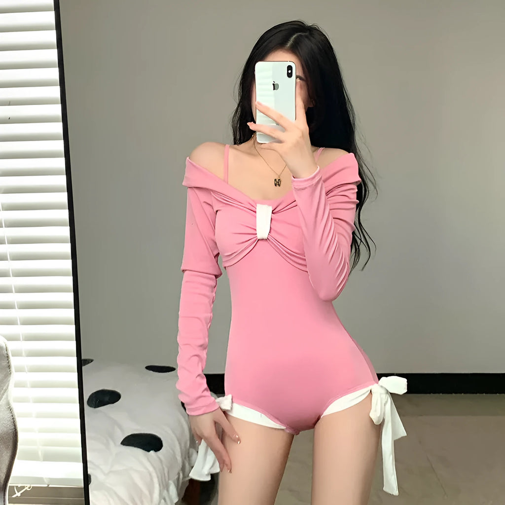 Women's long sleeve one-piece swimsuit in black or pink colours
