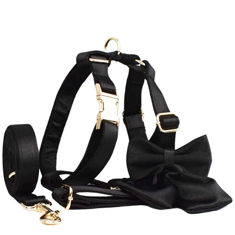 Complete dog walking set with cloth collar, leash, chest harness and bow tie accessory in multiple sizes