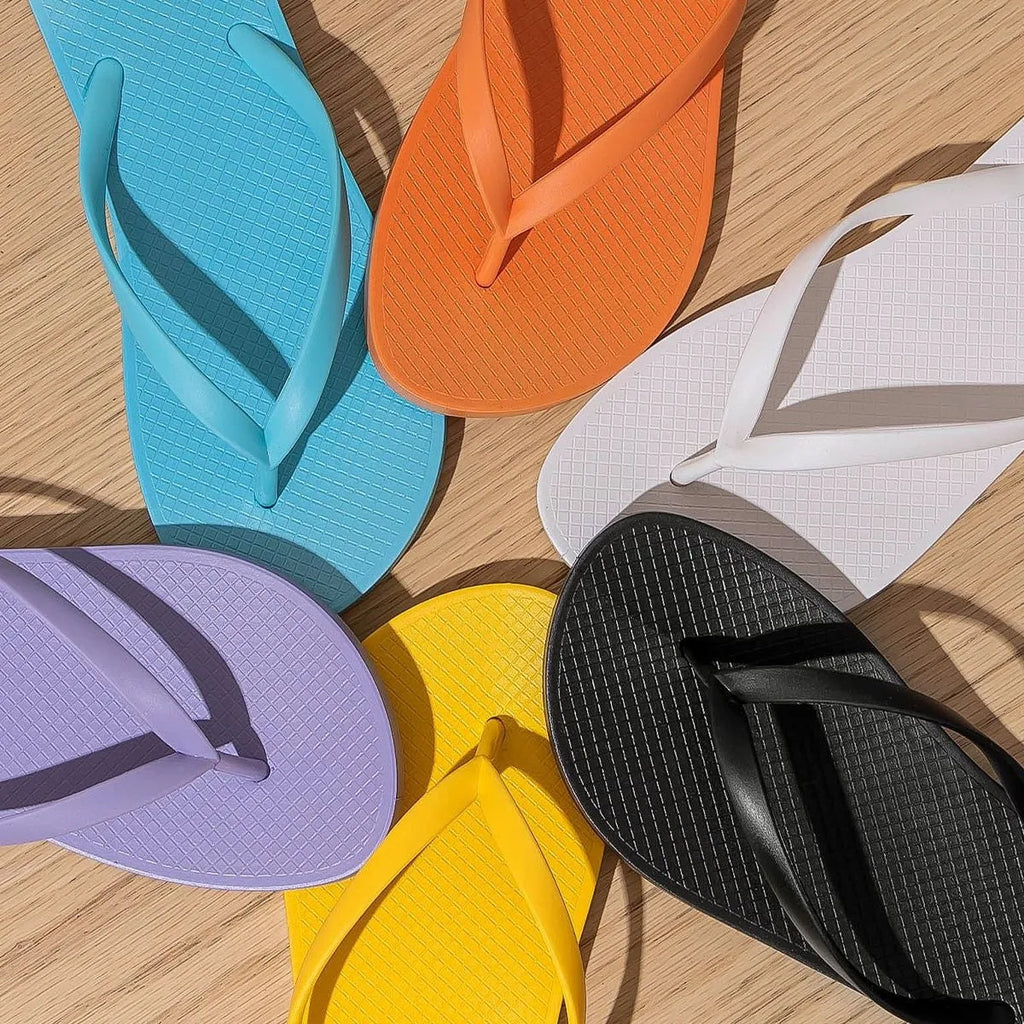 Foldable beach slippers with non-slip PVC sole in black colour showing hollow out design