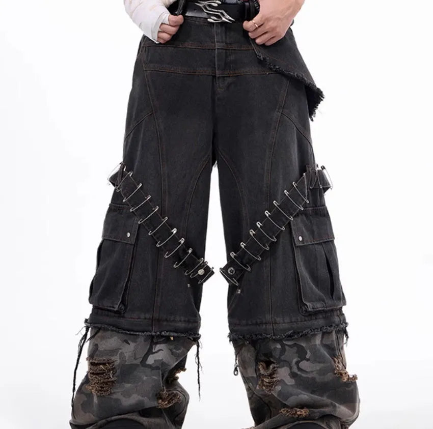 Grey men's camouflage jeans with splicing construction and pin details on cotton denim fabric