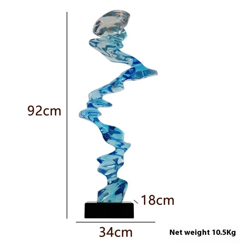 Modern minimalist abstract still life decorative ornament in gold, silver, or blue resin finish.