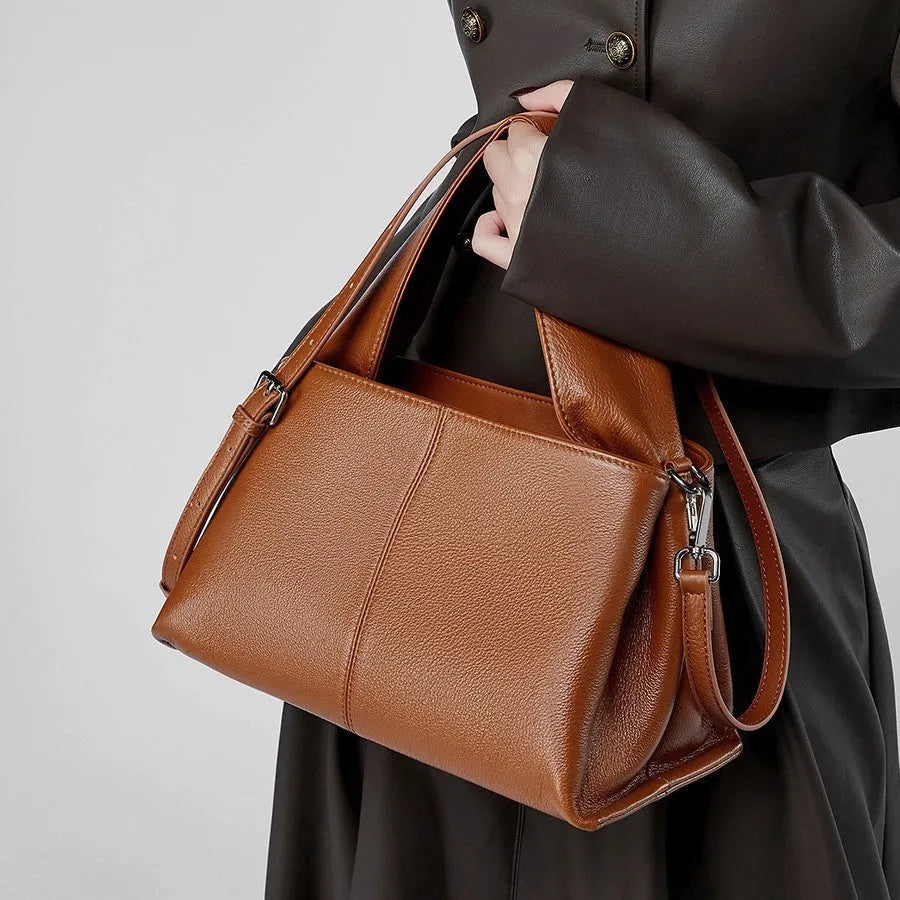 Retro texture cowhide messenger bag in horizontal square shape with double-joint shoulder straps