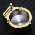 Large blue metal ashtray with a built-in permanent match lighter and three cigarette slots.