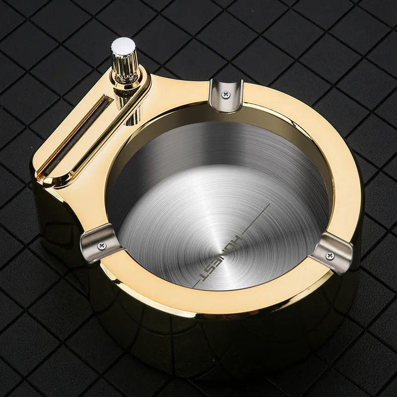Large blue metal ashtray with a built-in permanent match lighter and three cigarette slots.