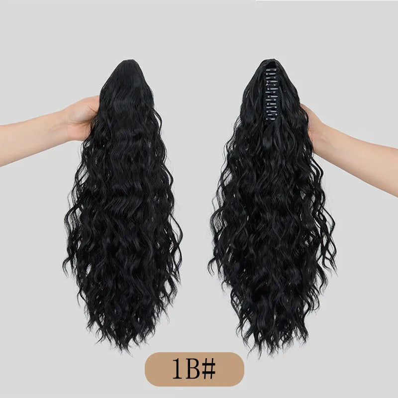 Corn curler style synthetic wig with a water ripple grip ponytail, shown in a dark colour.