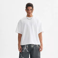 Men's loose fit pure cotton short sleeve t-shirt on a hanger, shown in apricot colour.
