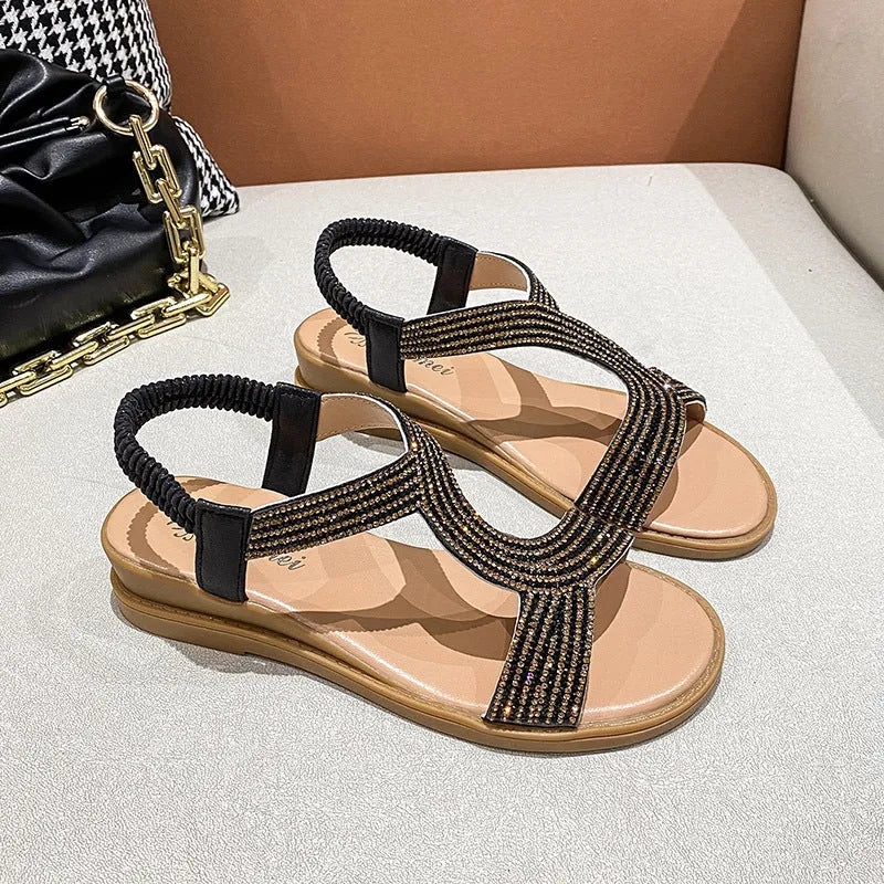 Women's gold patent leather beach sandals with rhinestone decoration and round toe design
