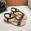 Women's gold patent leather beach sandals with rhinestone decoration and round toe design