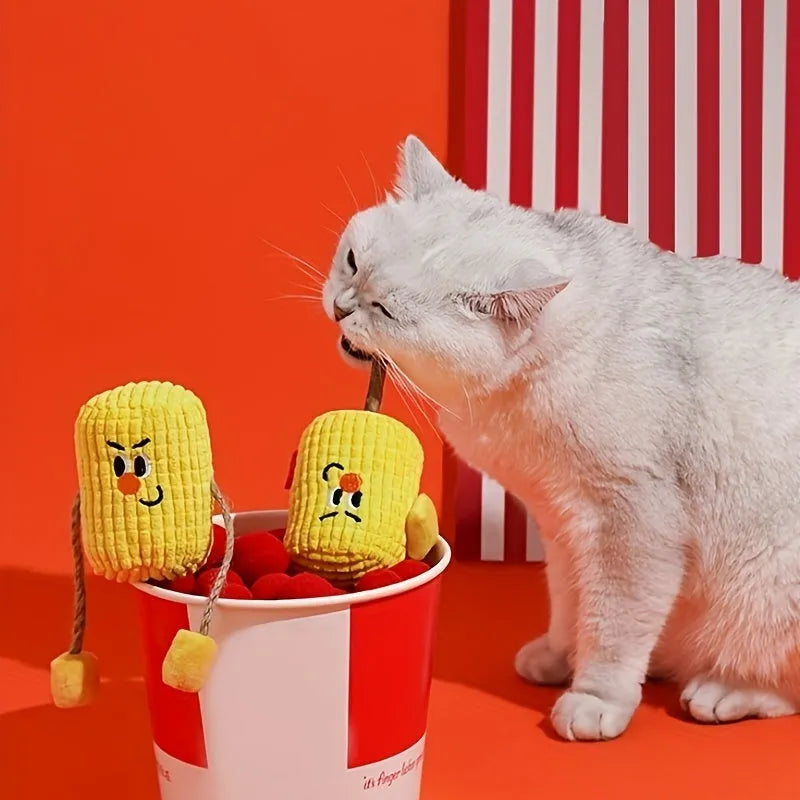 Corn cob shaped cat toy made from natural polio wood on a white background.