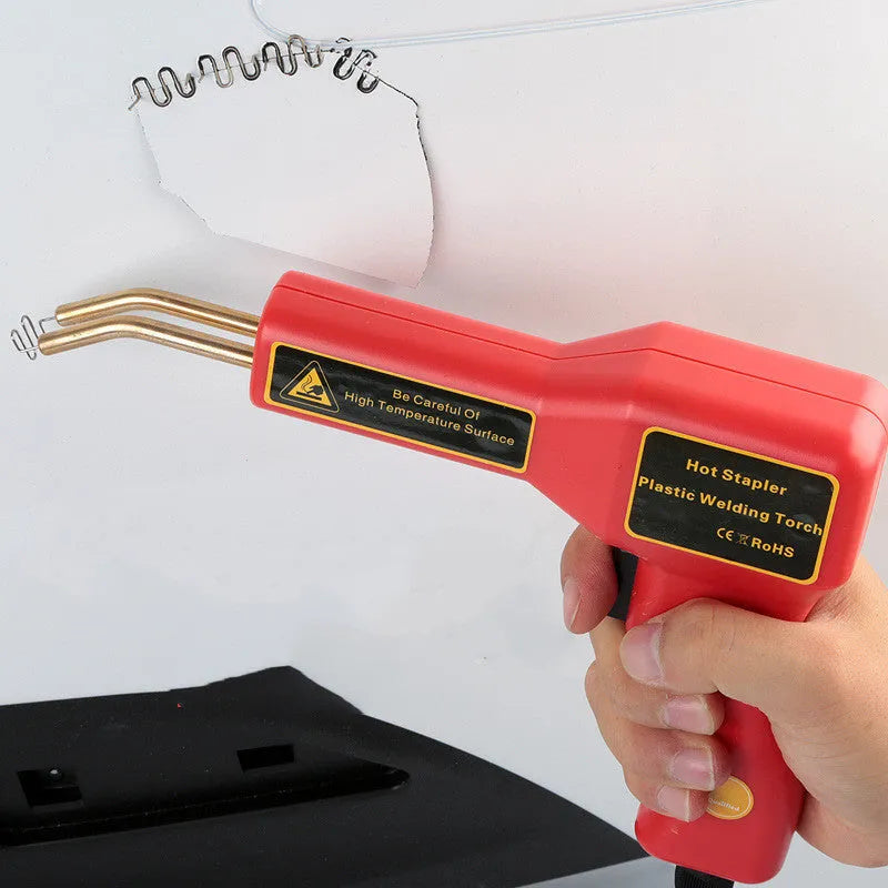 Red CR307 model 30W plastic welding gun for car bumper repair on a workbench.