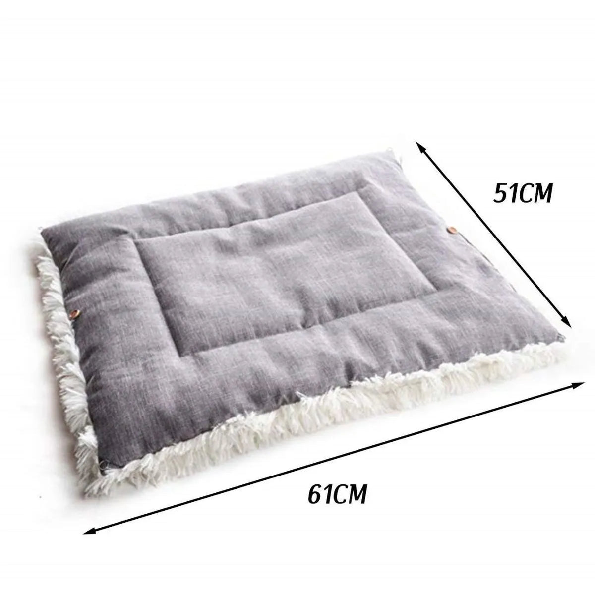 Grey plush pet blanket and bed with raised sides and a black non-slip bottom, shown on a wooden floor.