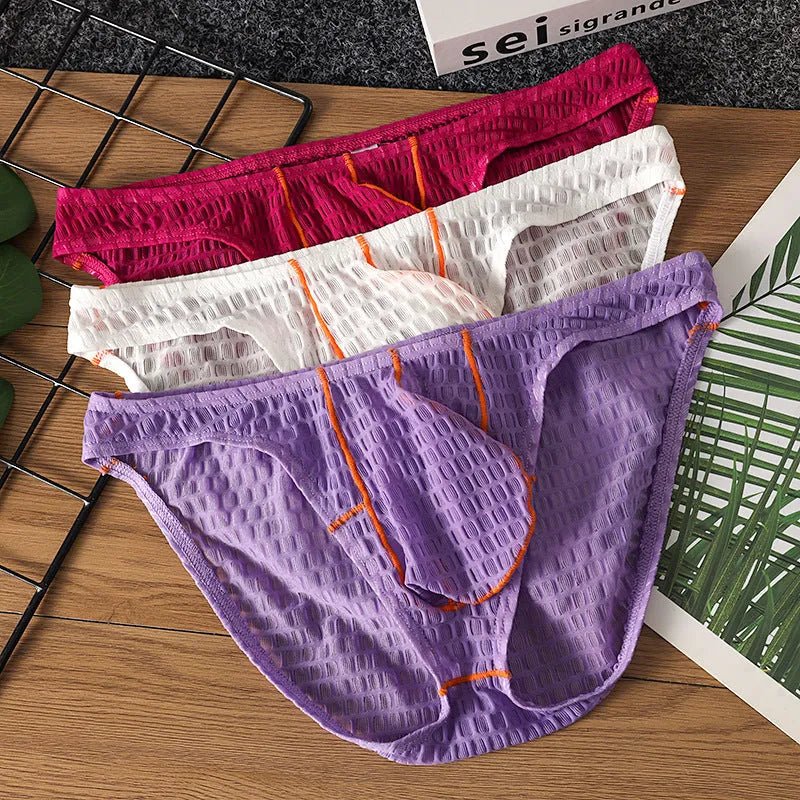 Men's solid colour ice silk lace low waist briefs for sports in white, black, green, rose red, and light purple.