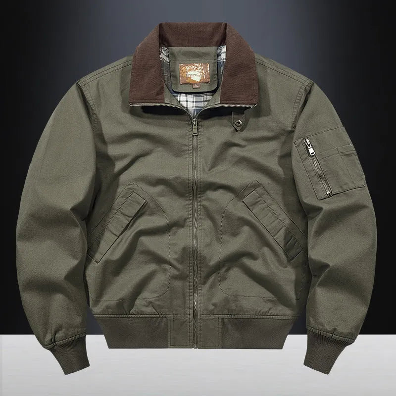 Men's camel coloured washed cotton baseball-style flight jacket on a hanger