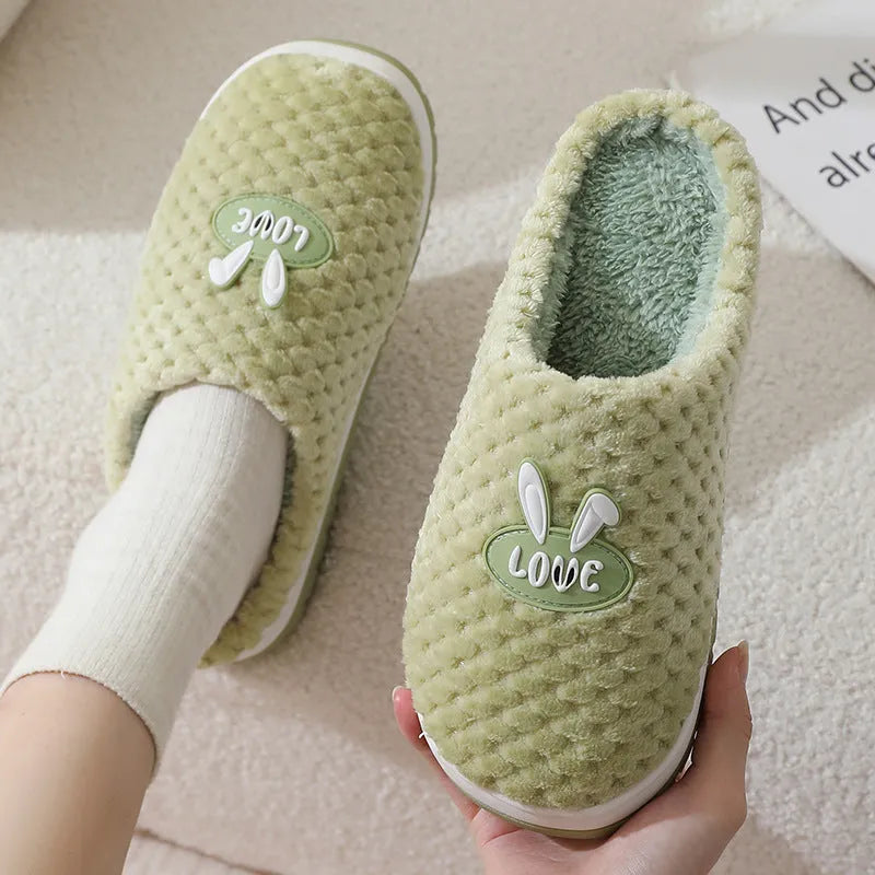 Women's rabbit plaid artificial fur house slippers with a thick rubber non-slip sole in a selection of colours.