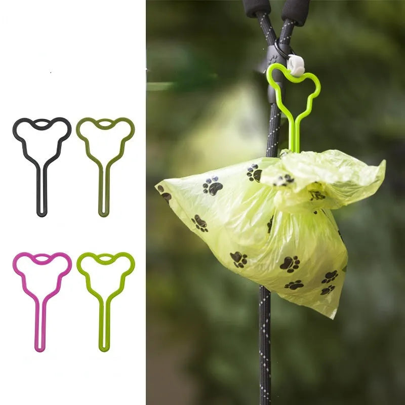 A hands-free dog poop bag holder with a clip and Velcro strap, shown in a random colour from the available selection.