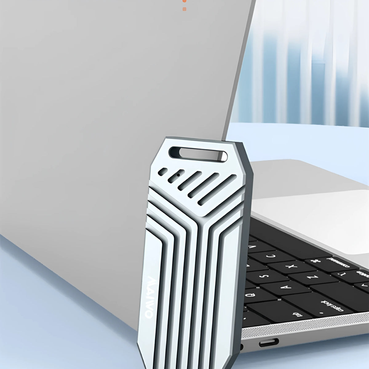 Thunderbolt 4 compatible aluminium M.2 NVMe SSD external enclosure in silver, grey, and grey with fan versions.