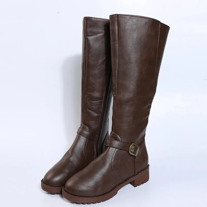 Women's solid colour knight boot with buckle detail, round toe, and square rubber heel.