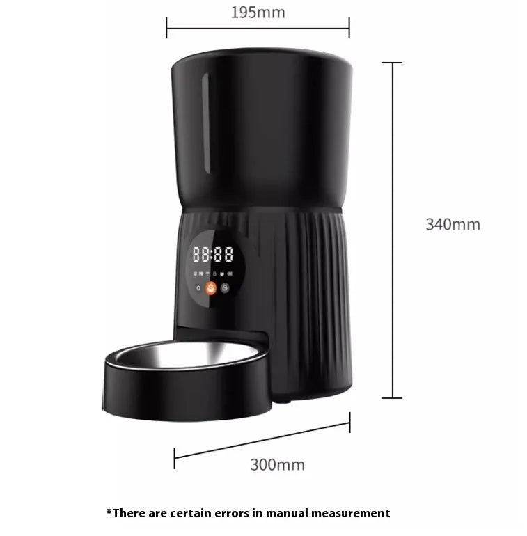 Black and white smart automatic pet feeder with USB cable and mobile app display showing feeding schedule.