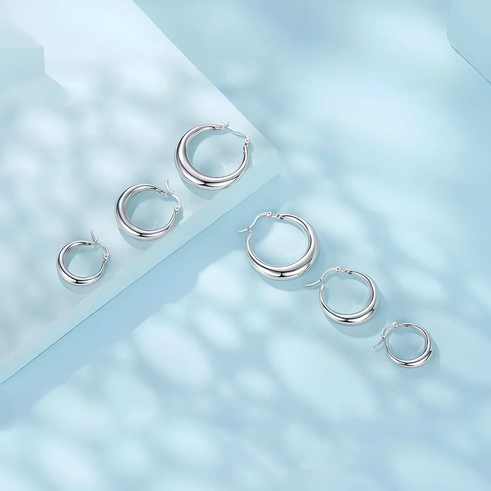 Geometric ring design ear clip earrings in copper alloy with silver needle fastening
