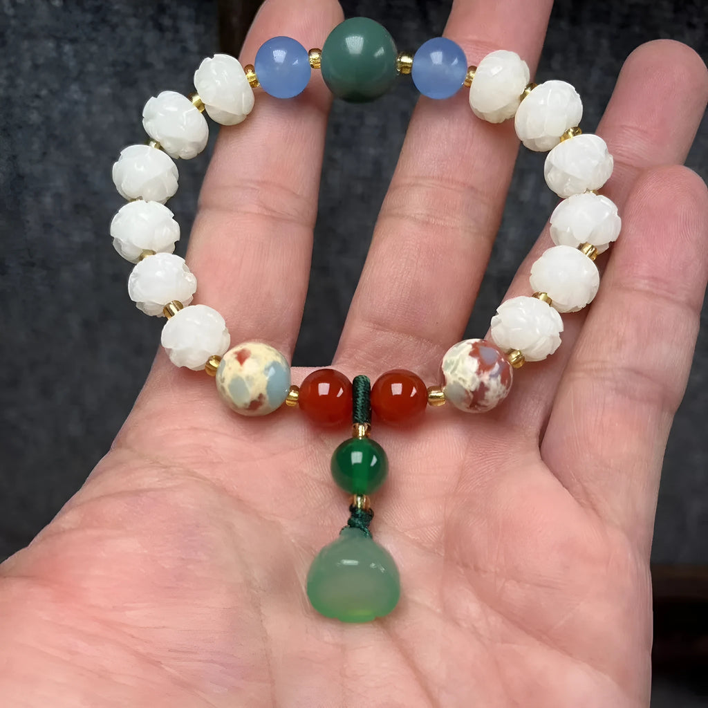 Carved bodhi root and white jade pumpkin lotus beads bracelet with cat's paw pendant.