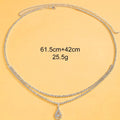 Gold or silver women's waist chain with water drop pendant and rhinestone decoration, showing lobster clasp closure.