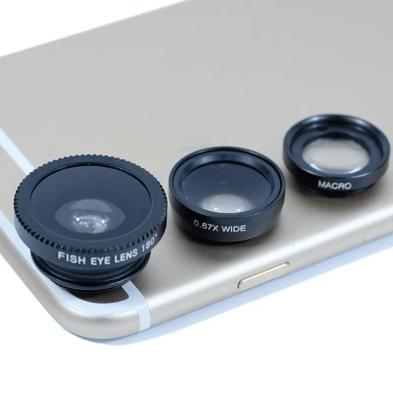 Smartphone external camera lens kit showing wide-angle, macro, and fisheye lenses in metal housing.