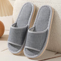 Women's open-toe slippers in linen and cotton, shown in a marled red colour with a thickened sole.