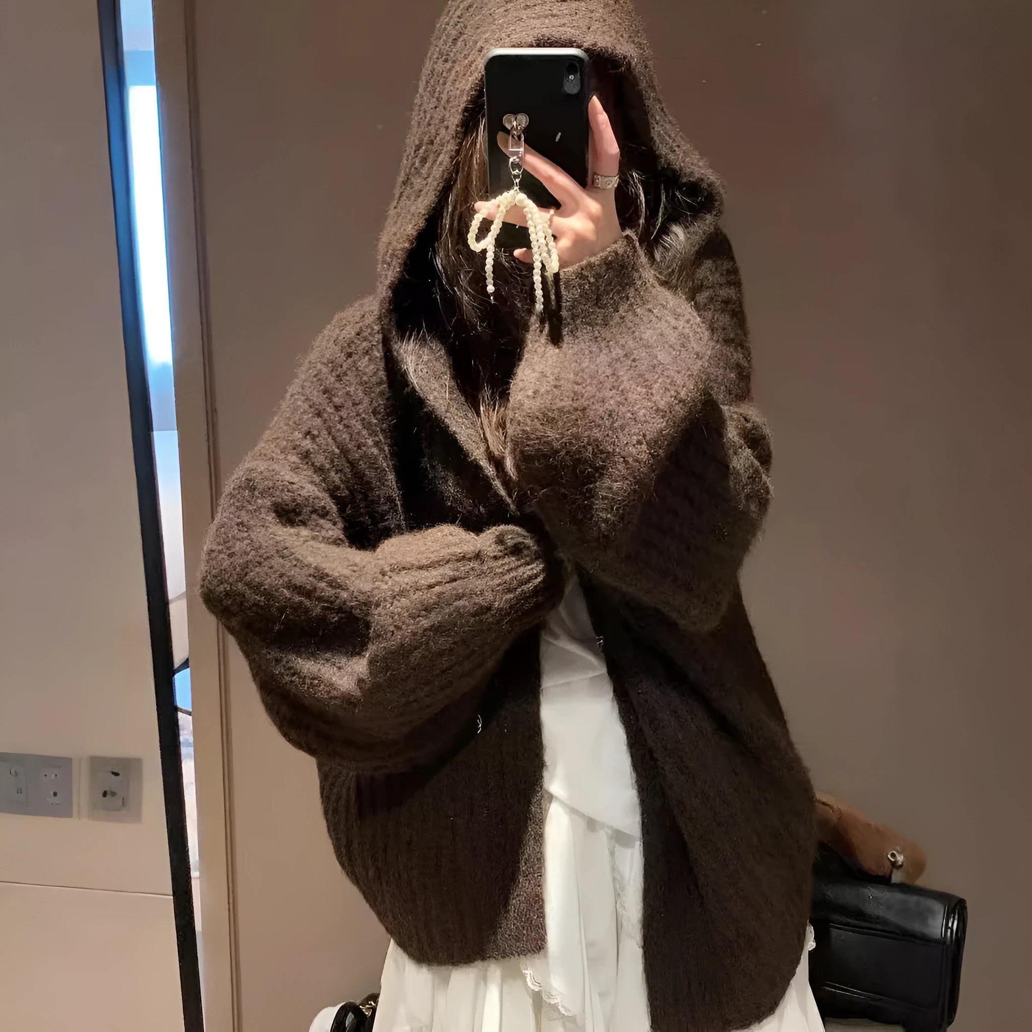 Retro style women's hooded cardigan in dark grey, shown loose-fit as a casual outer layer.