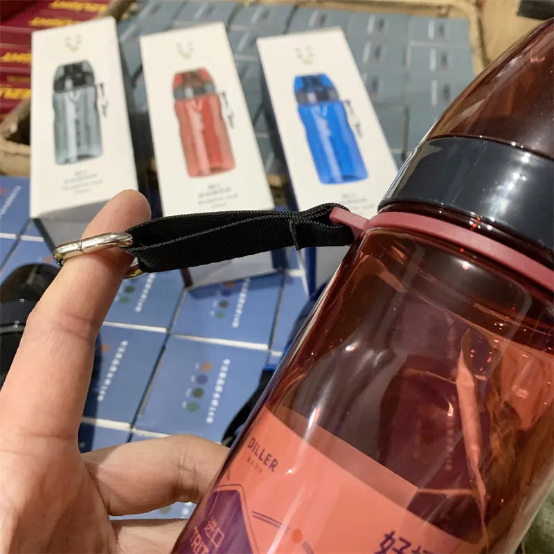 Blue portable sports water cup with a separate compartment for loose-leaf tea.