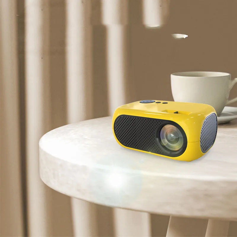 M24 micro mini portable LED projector in gold or white with power adapter and AV cable
