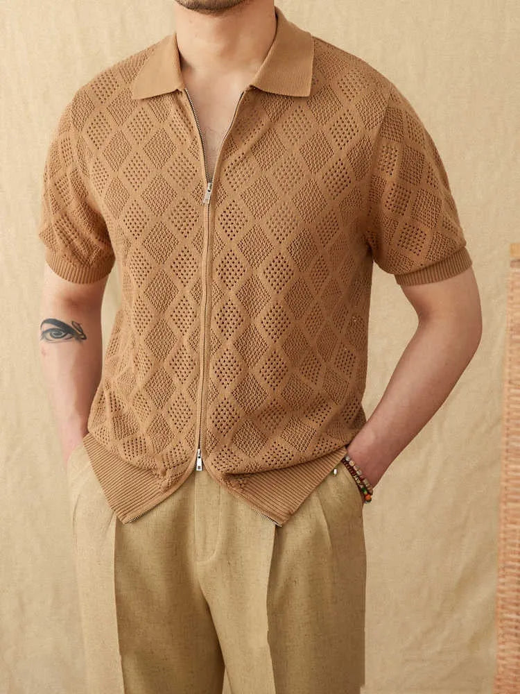 White cotton cardigan with zipper front and lapel collar showing short sleeve design